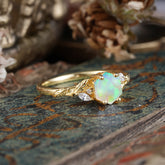 Nature-Inspired 4 - Prong Kite - Cut Natural Opal Ring